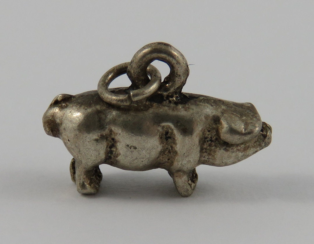Silver shop pig charm