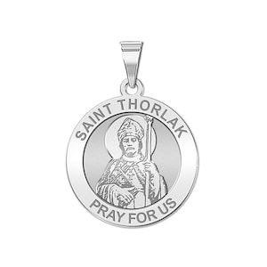 May include: Silver pendant featuring a round medallion with a depiction of Saint Thorlak, a bishop holding a staff. The medallion is inscribed with "SAINT THORLAK PRAY FOR US".