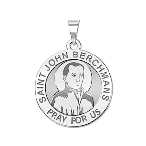 May include: Silver pendant featuring a depiction of Saint John Berchmans, with the inscription "Saint John Berchmans Pray For Us".