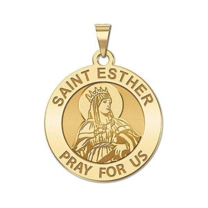 May include: Gold-toned pendant featuring a depiction of Saint Esther with the text "Saint Esther Pray For Us".