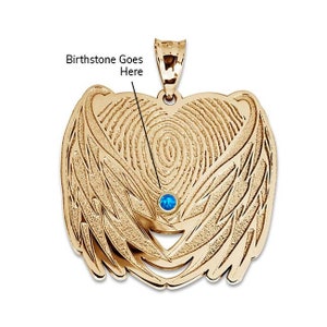May include: Gold pendant featuring a fingerprint design with angel wings. A blue gemstone is set in the centre of the fingerprint.