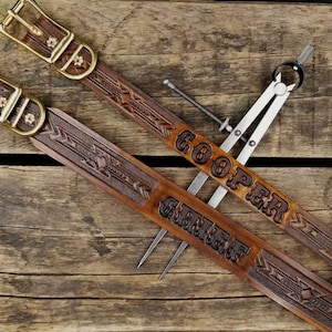 Design your own leather dog collar with your dogs name tooled onto the leather like a 1950s Western belt