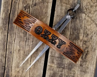 Design your own leather dog collar with your dogs name tooled onto the leather like a 1950s Western belt