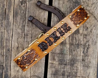 your dogs name on studded leather dog collar personalized on the leather like a 1950s Western belt