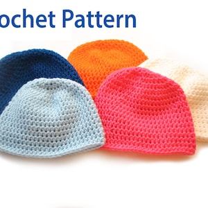 May include: Five crocheted hats in different colors: light blue, orange, pink, white, and navy blue. The hats are arranged in a semi-circle on a white background. Crochet Pattern.