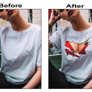 May include: A white t-shirt with a red and black graphic of a spider crawling on a torn piece of fabric.