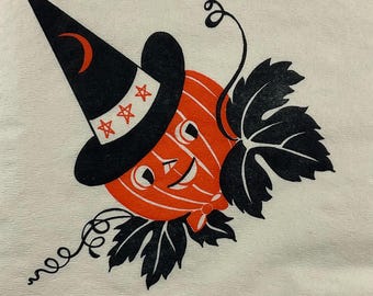 May include: A vintage Halloween illustration featuring an orange pumpkin wearing a black witch hat with a crescent moon and stars. The pumpkin has a smiling face and is surrounded by black leaves and vines. The design is on a white background.