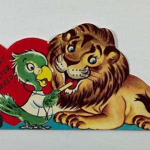 May include: Vintage Valentine's Day card featuring a cartoon lion and a parrot doctor. The parrot holds a thermometer, and the heart-shaped card reads "VALENTINE You're just what the doctor ordered."