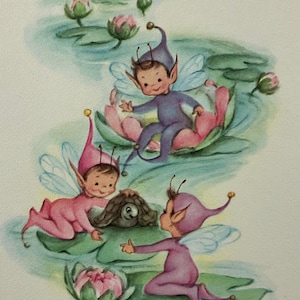 May include: A greeting card illustration featuring three small winged creatures in purple and pink outfits on lily pads in a pond. The text reads Sending many wishes at the top and To get you better and then at the bottom. A small turtle is visible.