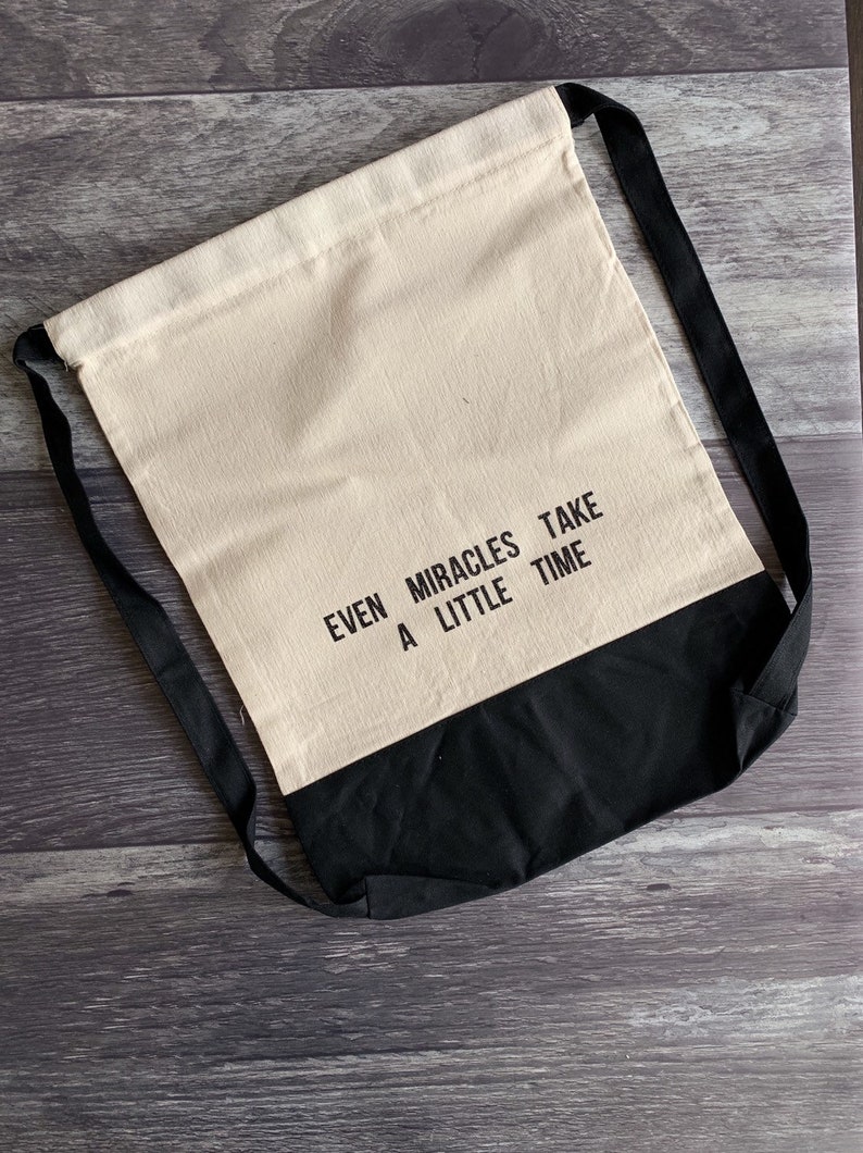 Even Miracles Take a Little Time Drawstring Backpack
