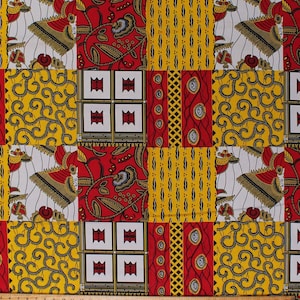 May include: Red, yellow, and white fabric with a patchwork design. The fabric features geometric patterns, floral motifs, and stylized birds.