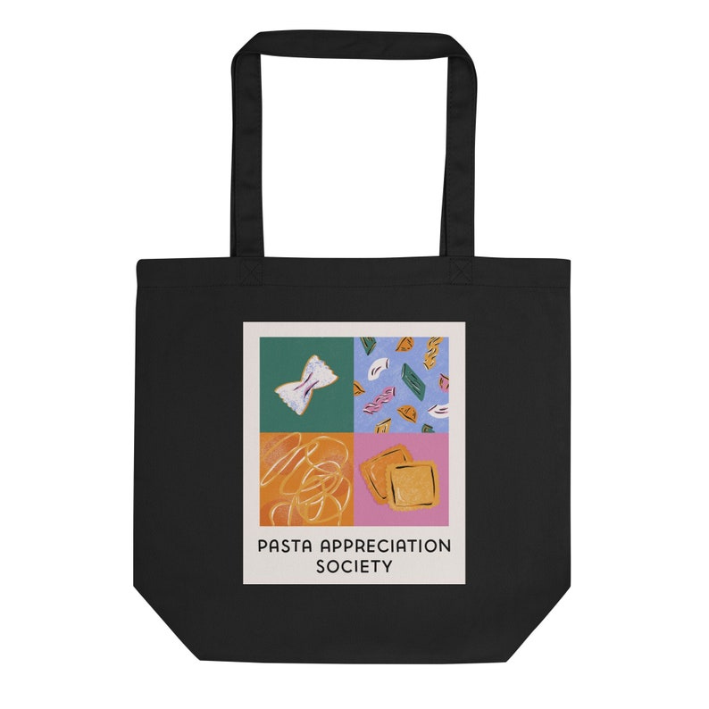 May include: Black tote bag with a white graphic of different types of pasta in a colorful square design. The text "PASTA APPRECIATION SOCIETY" is printed below the graphic.