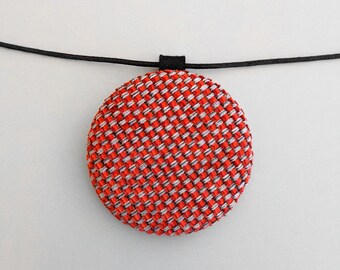 Oversized necklace in upholstery, round pendant in orange velvet