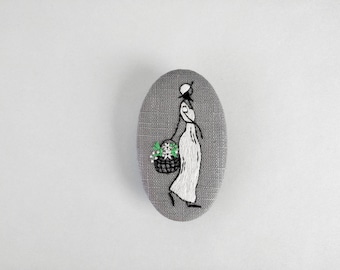 Large gray brooch, embroidery girl and her basket of flowers