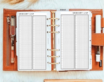 May include: A tan leather six-ring binder planner open to two pages labeled GROCERY LIST with grid paper columns. The planner includes a metal ring mechanism, a zippered pocket with a pen, a side pen loop with a white pen, and a TODAY tab.