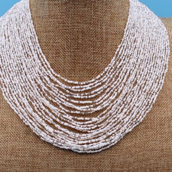 WHITE NECKLACE hand beaded  24 multi-layered strands with transparent accent beads