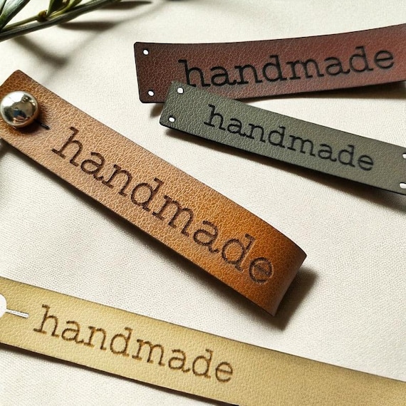 Etichette pelle abbigliamento personalizzazione produzione accessori
