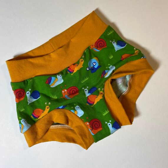 RTS Tuck Buddies 1.0 KIDS - underwear with organic cotton fleece lining in the front for transgender girls - Rainbow snails with mustard