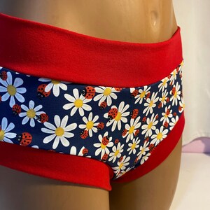 LGBTQ+ Tuck Buddies Trans femme/AMAB boyshort or bikini style tucking panties. 1 pair gender affirming panty, navy daisy ladybug