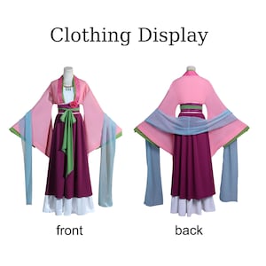 May include: A two-piece costume displayed front and back. The costume features a pink top with long, flowing sleeves and a dark purple skirt. The sleeves have blue and green accents. The text "Clothing Display" is at the top.
