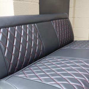 Red stitched bench seat cover