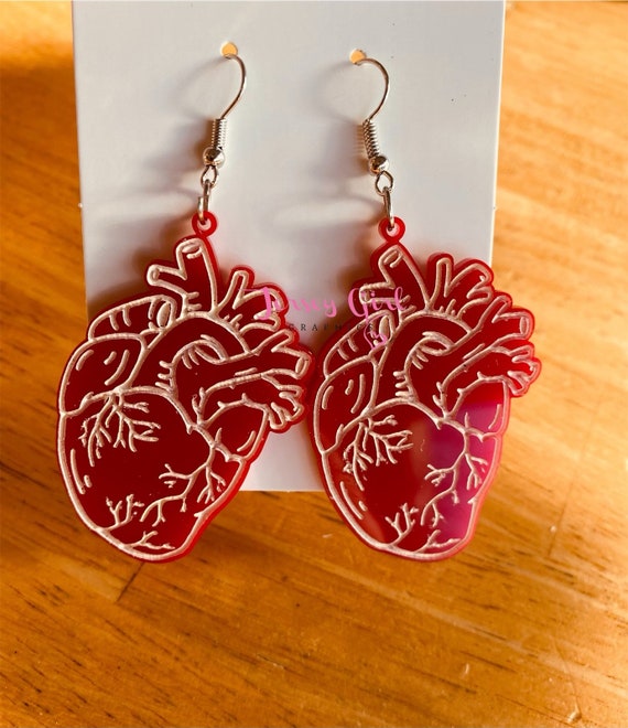 Human cheap heart earrings