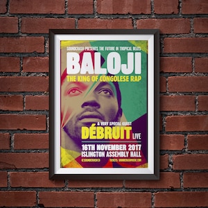 May include: A concert poster for Baloji, the King of Congolese Rap, with a special guest, Débruit. The poster features a colorful portrait of Baloji and the text "SOUNDCRASH PRESENTS THE FUTURE IN TROPICAL BEATS" at the top. The concert is scheduled for November 16, 2017 at the Islington Assembly Hall. Tickets are available at SOUNDCRASHMUSIC.COM.