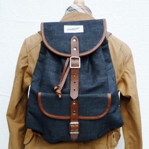 Raw denim & leather backpack