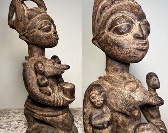 Yoruba Maternity Figure with Twins. Nigeria.mother and children. Carved Wood. Circa 1980.