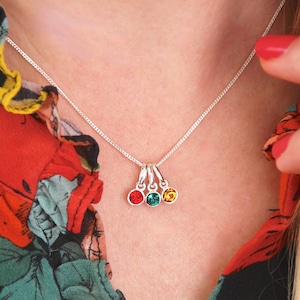 Sterling Silver Family Birthstone Necklace showing the necklace being worn with a Ruby/July, Emerald/May and Citrine/November birthstone combination