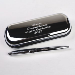 Personalised pen and Box set shown with engraving in script play font