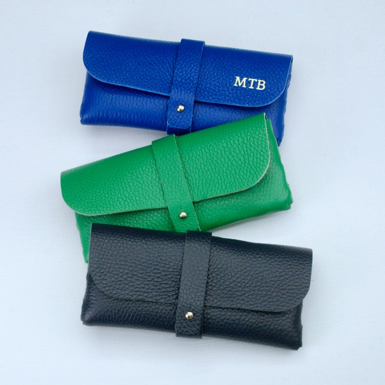 Personalised Leather Glasses case shown close up in cobalt blue, green and navy