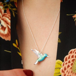 Sterling Silver and Enamel Hummingbird Necklace being worn.