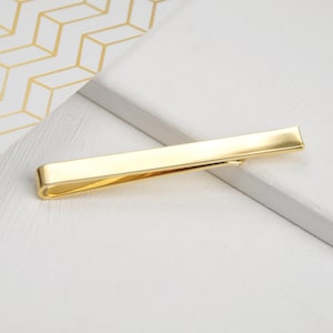 Personalised Tie Slide shown in yellow gold plated finish.