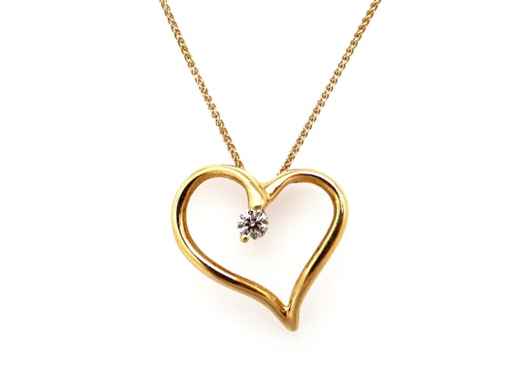 Incredible Hearts on Fire 18k Yellow Gold .12ct Round