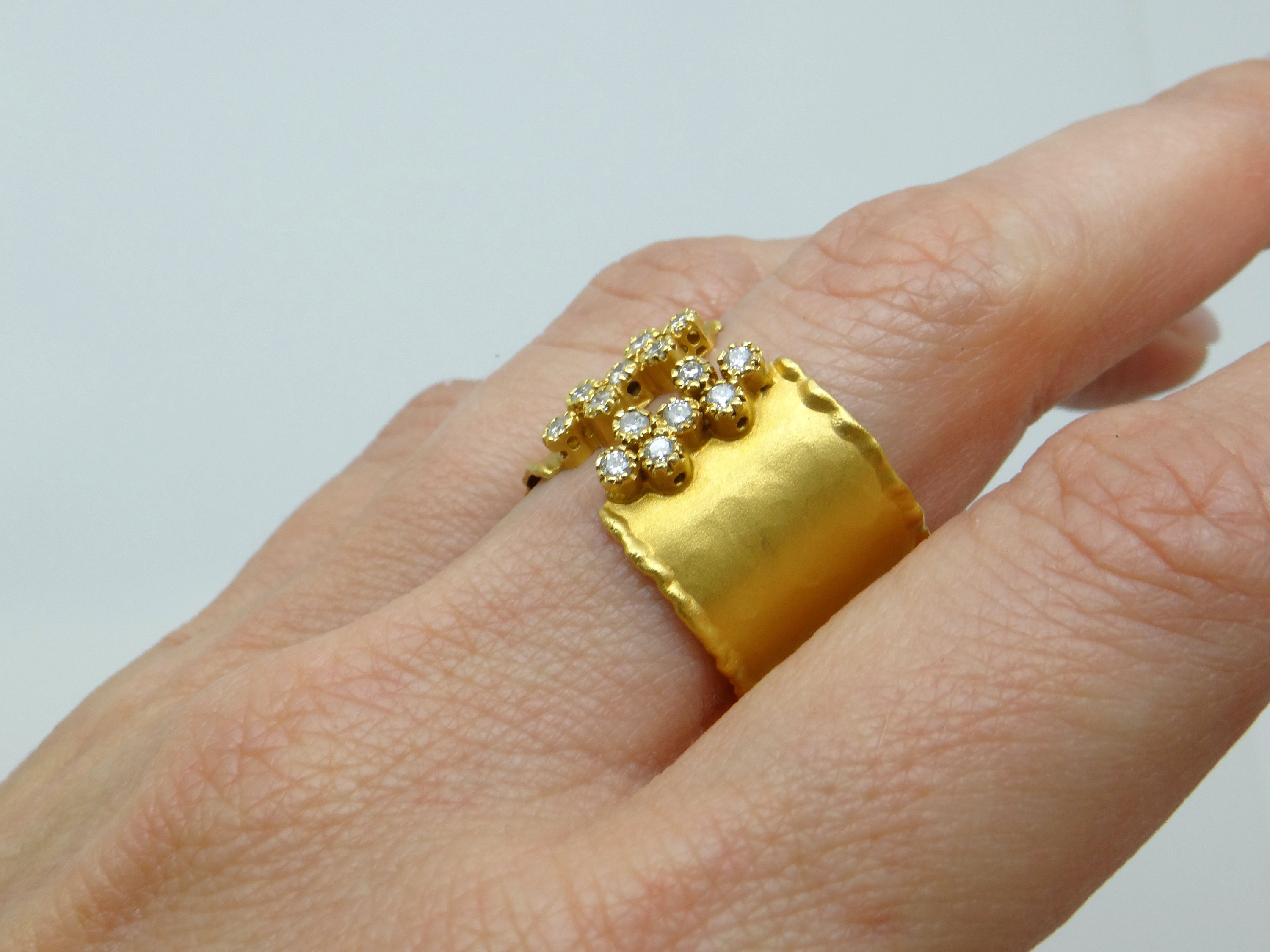 Marika 14k Yellow Gold .28ct Round Natural Diamond Bezel