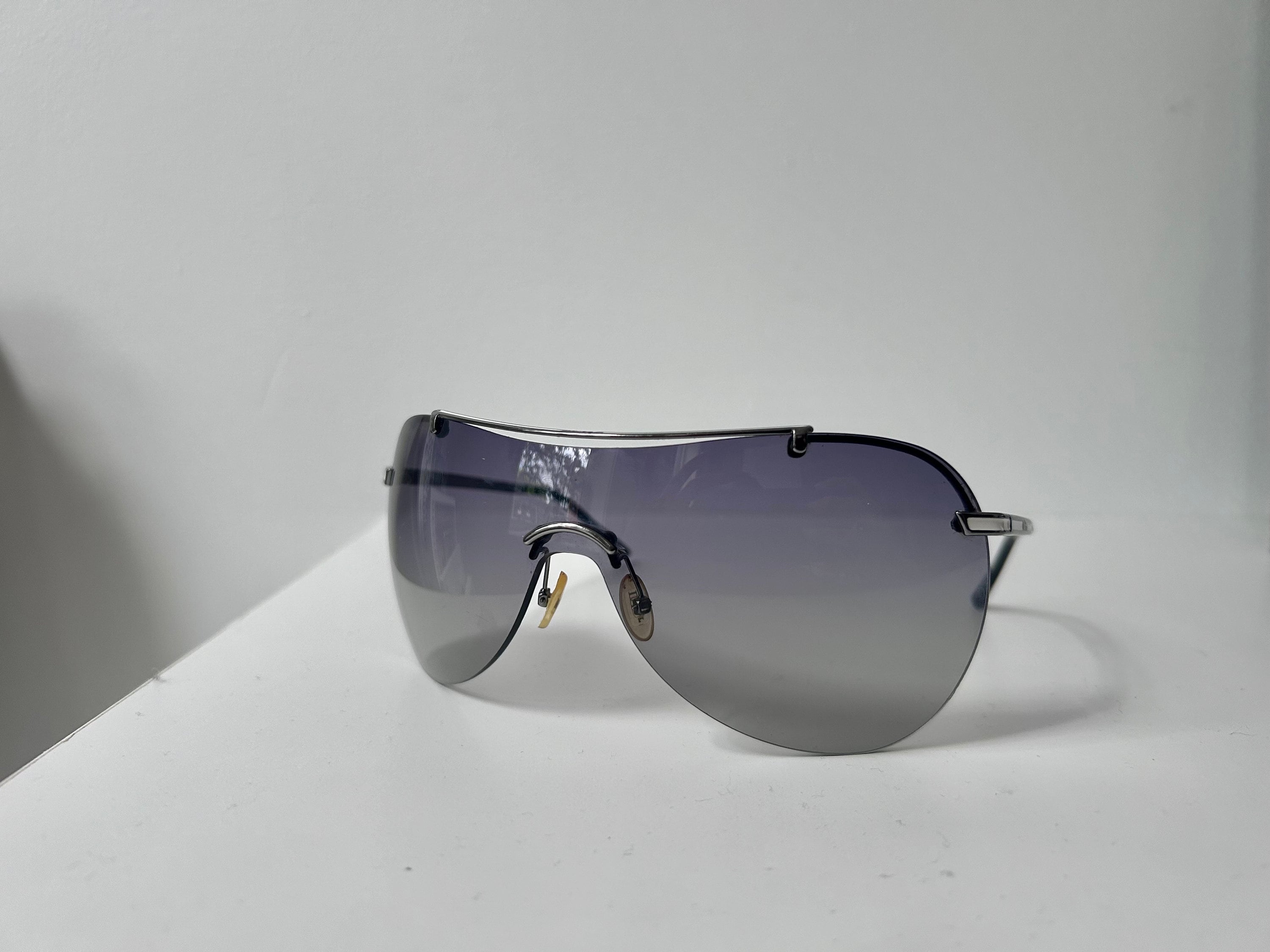 Vintage chanel shield sunglasses - Etsy 日本