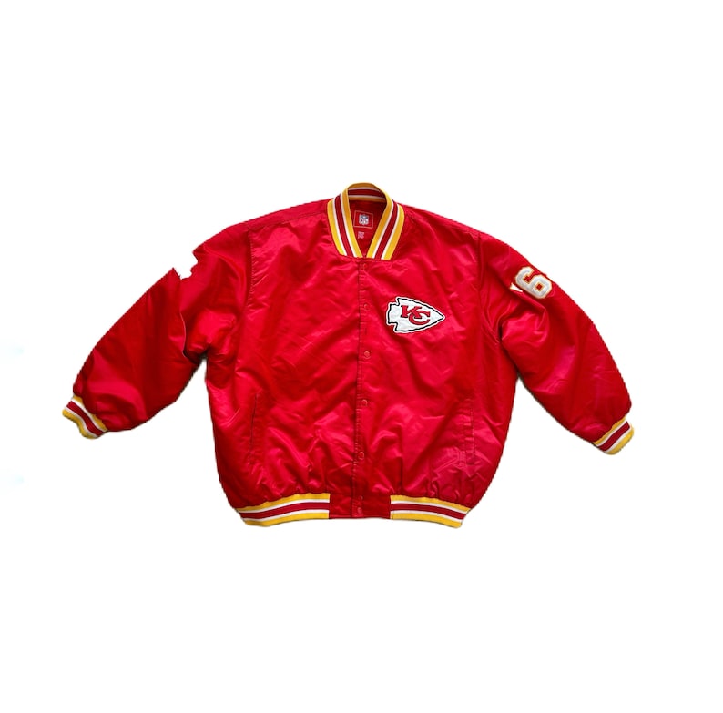 May include: Red satin bomber jacket with yellow and white trim. The jacket has a team logo on the left chest and the number "69" on the right sleeve.