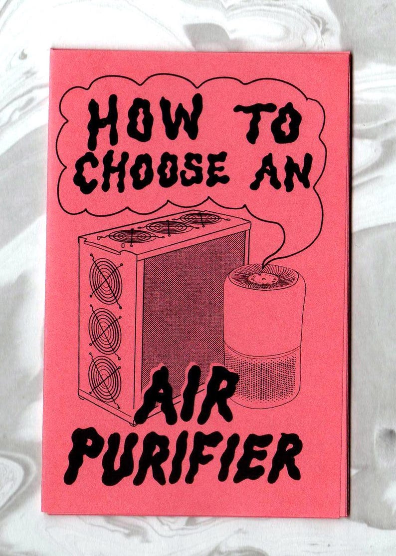 May include: A rectangular pink booklet with black line art illustrations of two different air purifier models. The text on the cover reads, "HOW TO CHOOSE AN AIR PURIFIER," with the words enclosed in a speech bubble graphic above the devices.