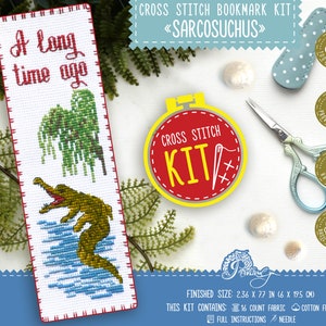 May include: Cross stitch bookmark kit featuring a crocodile with the text "A long time ago" and the title "Sarcosuchus". The kit includes 16 count fabric, cotton floss, full instructions, and a needle. The finished size is 2.36 x 7.7 inches.
