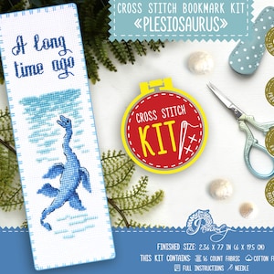 May include: Cross stitch bookmark kit featuring a blue plesiosaur with the text "A long time ago". The kit includes 16 count fabric, cotton floss, a needle, and full instructions. The finished size is 2.36 x 7.7 inches.