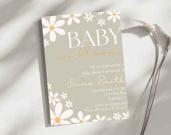 Può includere: Un invito per un baby shower a tema margherita. L'invito presenta le parole "BABY in bloom" in un carattere elegante, insieme ai dettagli dell'evento. L'invito è decorato con illustrazioni di margherite e ha una palette di colori tenui e neutri.