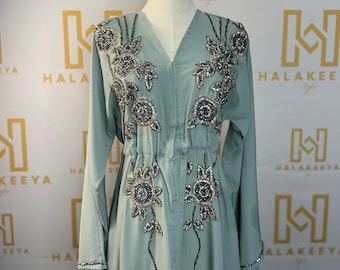 Verfraaid bescheiden abaya met hijab