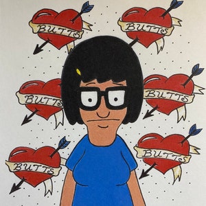 May include: A cartoon illustration of a woman with black hair and glasses. She is wearing a blue shirt and is surrounded by five red hearts with arrows through them. Each heart has a banner that says "BUTTS".
