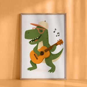 May include: A framed print showing a cartoon dinosaur playing a guitar. The green dinosaur wears a baseball cap and orange glasses, and smiles. Musical notes float above the guitar. The guitar is brown and orange.