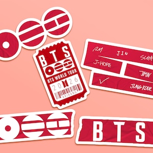 May include: A set of three ceramic mugs with a speckled, matte finish. The mugs are in shades of cream, light gray, and dark gray. Each mug has a simple, minimalist design, perfect for coffee or tea.