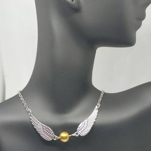 Flying Golden Ball Necklace image 1