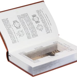 May include: An open hardcover book with a rectangular hollow cut into the center of its pages. The visible pages contain printed text and scientific diagrams labeled Fig 3, Fig 4, and Fig 5, detailing the operation of a coil and ring.