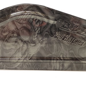 May include: A black metal tool box with a graphic print of a skull and the text "B&M Pro Ratchet".