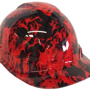 May include: A red and black hard hat with a flame pattern. The hard hat has a brim and is made of a durable material.